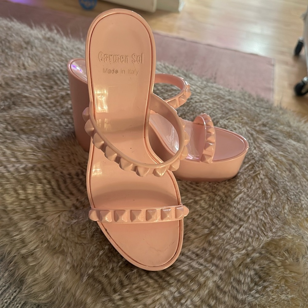 Carmen sol pink wedge heels.